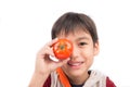 Little boy showing tomato good Royalty Free Stock Photo