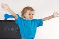 Little boy shows Einstein's formula Royalty Free Stock Photo