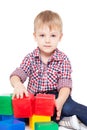 Little boy sits on a floor Royalty Free Stock Photo