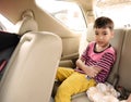 Little boy sitting in the car travelling Royalty Free Stock Photo