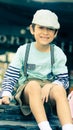 Little boy sitting at the restuarant vintage Royalty Free Stock Photo