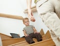 Little boy sitting on stairs Royalty Free Stock Photo