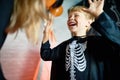 Little Boy in Skeleton Costume