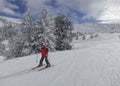 Little boy skiing in a solitary montain