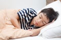 Little boy sleeping on bed Royalty Free Stock Photo