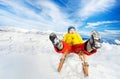 Little boy slide down on sledge legs first Royalty Free Stock Photo