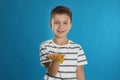 Little boy with slime on blue Royalty Free Stock Photo