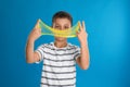 Little boy with slime on blue background Royalty Free Stock Photo