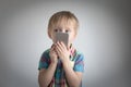 Little boy with a smartphone in his hands. childs portrait