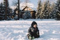 little boy in blue jacket play with snow, winter holidays Royalty Free Stock Photo