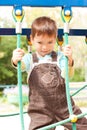 A little boy smiling and playing