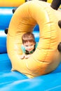 A little boy smiling and playing