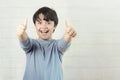 Little boy smiling showing thumbs up Royalty Free Stock Photo