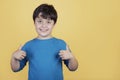 Little boy smiling showing thumbs up Royalty Free Stock Photo