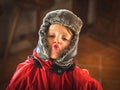 Little boy in snowsuit making funny expressions Royalty Free Stock Photo