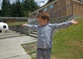 Little Boy with Soccer Ball Mid Air Royalty Free Stock Photo