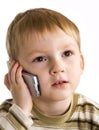 Little boy speaks by phone