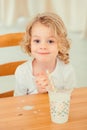Little boy with spilled milk Royalty Free Stock Photo