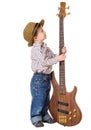 Little boy standing with rock guitar Royalty Free Stock Photo