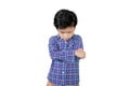 Little boy standing with sad expression on studio Royalty Free Stock Photo