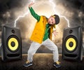 The little boy in the style of Hip-Hop . Children`s fashion.Cap and jacket. The Young Rapper.Cool Dancer. Royalty Free Stock Photo