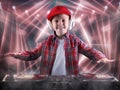 The little boy in the style of Hip-Hop .Cool rap dj. Children`s fashion.Cap and jacket. The Young Rapper. Royalty Free Stock Photo
