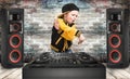 The little boy in the style of Hip-Hop .Cool rap dj. Children`s fashion.Cap and jacket. The Young Rapper. Royalty Free Stock Photo