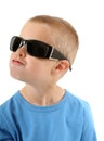 Little boy in sunglasses singing