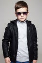 Little boy in sunglasses. stylish kid in leather Royalty Free Stock Photo