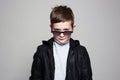 Little boy in sunglasses. stylish kid in leather Royalty Free Stock Photo