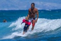 Little boy surfing on Maui. Royalty Free Stock Photo