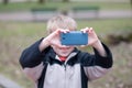 Little boy taking photos Royalty Free Stock Photo