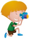 Little boy taking picture with camera