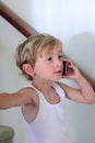 Little boy talking on the cell phone Royalty Free Stock Photo