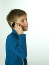 Little boy talking by cell phone Royalty Free Stock Photo