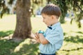 Little boy talking on smart watch with mother Royalty Free Stock Photo