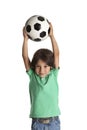 Little boy throwing a soccer ball Royalty Free Stock Photo