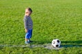 Little boy about to kick a soccer Royalty Free Stock Photo