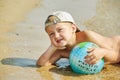 A little boy to take to the sea with the ball Royalty Free Stock Photo