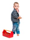 Little boy with toy tools and helmet Royalty Free Stock Photo