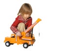The little boy with a toy - a truck crane Royalty Free Stock Photo
