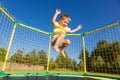 Little boy on a trampoline