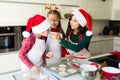 Little boy trying a gingerbread cookie Royalty Free Stock Photo