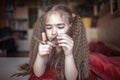 Little boy twirling her sisters beautiful hair in fingers to calm down, negative emotions Royalty Free Stock Photo