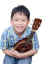 Little boy with ukulele Royalty Free Stock Photo