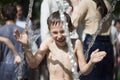 Little boy under the water jets. Royalty Free Stock Photo