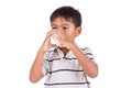 Asian little boy using an asthma inhaler Royalty Free Stock Photo