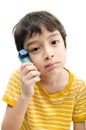 Little boy using Asthma inhaler for breathing Royalty Free Stock Photo