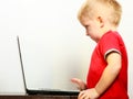 Little boy using laptop pc computer at home Royalty Free Stock Photo