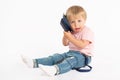 Little boy using mobile phone. Child playing on smartphone. Technology, mobile apps, children and parental advisory Royalty Free Stock Photo